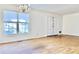 Spacious living room featuring hardwood floors and large windows at 4653 Flat Bridge Sw Rd, Stockbridge, GA 30281