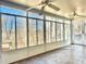 Bright sunroom with view and ceiling fans at 4653 Flat Bridge Sw Rd, Stockbridge, GA 30281