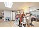 Unfinished basement with clutter and a small retro refrigerator at 5545 Woodsong Trl, Dunwoody, GA 30338