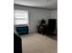 Office space with blue drawers and a natural light source at 5545 Woodsong Trl, Dunwoody, GA 30338