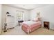 Charming bedroom with a single bed, and a window with a lush view at 5545 Woodsong Trl, Dunwoody, GA 30338