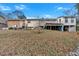 House backyard view with deck and storage at 2401 Prestige Valley Ct, Morrow, GA 30260