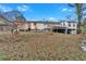 House backyard view with deck and storage at 2401 Prestige Valley Ct, Morrow, GA 30260
