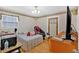 Bedroom with a double bed and hardwood floors at 2401 Prestige Valley Ct, Morrow, GA 30260