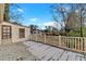 Wooden deck overlooks backyard with partial snow cover at 2401 Prestige Valley Ct, Morrow, GA 30260
