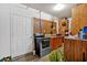Small kitchen with a stove, sink, and cabinets at 2401 Prestige Valley Ct, Morrow, GA 30260
