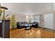 Bright living room with hardwood floors and comfy seating at 2401 Prestige Valley Ct, Morrow, GA 30260