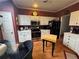 Kitchen with white cabinets, stainless steel appliances, and butcher block island at 3025 Park Chase Dr, Alpharetta, GA 30022