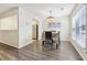 Bright dining area with hardwood floors and a kitchen view at 838 Cannon Run, Marietta, GA 30064