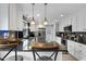 Bright kitchen features granite countertops, stainless steel appliances, and ample counter space at 4656 Bryant Rd, Snellville, GA 30039