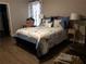 Bedroom with a queen-size bed and ensuite bathroom at 110 Sampson Ct, Covington, GA 30016