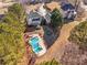 Aerial view of home with pool at 164 Castlewood Rd, Tyrone, GA 30290