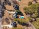 Aerial view of homes and a pool at 164 Castlewood Rd, Tyrone, GA 30290