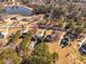 Aerial view of neighborhood with lake at 164 Castlewood Rd, Tyrone, GA 30290