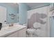 Full bathroom with shower/tub combo and T-Rex shower curtain at 164 Castlewood Rd, Tyrone, GA 30290