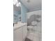 Clean bathroom with shower, toilet and white vanity at 164 Castlewood Rd, Tyrone, GA 30290
