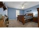 Cozy bedroom with a double bed and plenty of space for storage at 164 Castlewood Rd, Tyrone, GA 30290
