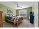 Bedroom with a double bed, ceiling fan and green walls at 164 Castlewood Rd, Tyrone, GA 30290