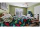 Bedroom with a double bed and dinosaur bedding at 164 Castlewood Rd, Tyrone, GA 30290