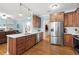 Eat-in kitchen features stainless steel appliances and ample cabinet space at 164 Castlewood Rd, Tyrone, GA 30290