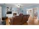 Spacious living room with hardwood floors, fireplace, and built-in shelving at 164 Castlewood Rd, Tyrone, GA 30290