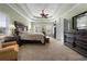Spacious main bedroom, featuring a large bed and ample space at 164 Castlewood Rd, Tyrone, GA 30290