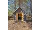 Small wooden shed for additional storage at 164 Castlewood Rd, Tyrone, GA 30290