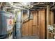 Unfinished basement with water heater and electrical panel at 37 Delmoor Nw Ct, Atlanta, GA 30311