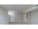 Spacious basement area with carpeted floor and multiple rooms at 37 Delmoor Nw Ct, Atlanta, GA 30311