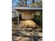 Single car carport with attached storage area at 1423 Graham Sw St, Atlanta, GA 30310