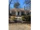 Charming brick home with a classic design and well-maintained landscaping at 1423 Graham Sw St, Atlanta, GA 30310