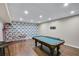Finished basement featuring a pool table and basketball game for entertainment at 2025 Fife Ridge Ct, Roswell, GA 30075