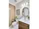 Bathroom with a wood vanity, tile floor, framed wall art and a shower with a beige curtain at 2025 Fife Ridge Ct, Roswell, GA 30075