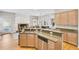 Well-lit kitchen featuring stainless steel appliances, breakfast bar seating, and lots of counter space at 2025 Fife Ridge Ct, Roswell, GA 30075