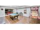 Basement recreation area is complete with a pool table, basketball game, and entertainment area at 2025 Fife Ridge Ct, Roswell, GA 30075