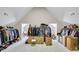 Large walk-in closet with vaulted ceiling offers ample storage space at 2025 Fife Ridge Ct, Roswell, GA 30075