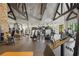 Well-equipped gym with modern exercise machines, high ceilings, and natural light at 918 Big Horn Holw, Suwanee, GA 30024