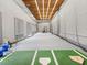 Indoor baseball training facility with a high ceiling and professional equipment at 918 Big Horn Holw, Suwanee, GA 30024
