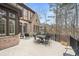 Spacious outdoor patio perfect for entertaining with elegant patio furniture at 918 Big Horn Holw, Suwanee, GA 30024