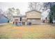 House exterior showcasing a large backyard and deck at 2211 Green Forrest Dr, Decatur, GA 30032