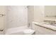 Updated bathroom featuring granite countertop and marble-tiled shower at 2211 Green Forrest Dr, Decatur, GA 30032