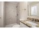 Clean bathroom with granite countertop and walk-in shower at 2211 Green Forrest Dr, Decatur, GA 30032