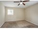 Well-lit bedroom with ceiling fan and neutral decor at 2211 Green Forrest Dr, Decatur, GA 30032