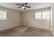 Spacious bedroom with ceiling fan and large windows at 2211 Green Forrest Dr, Decatur, GA 30032