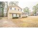 Two-story house with beige siding, dark-blue shutters, and a driveway at 2211 Green Forrest Dr, Decatur, GA 30032