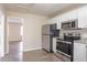 Modern kitchen, stainless steel appliances, granite countertops at 2211 Green Forrest Dr, Decatur, GA 30032
