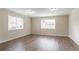 Spacious living room with hardwood floors and neutral walls at 2211 Green Forrest Dr, Decatur, GA 30032