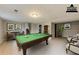 Finished basement with pool table and seating at 2906 Forestside Ln, Atlanta, GA 30349