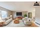 Virtually staged living room featuring neutral tones and hardwood floors at 2906 Forestside Ln, Atlanta, GA 30349