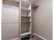 Large walk-in closet with shelving and hanging rods at 3088 Fox Chase Ct, Snellville, GA 30039